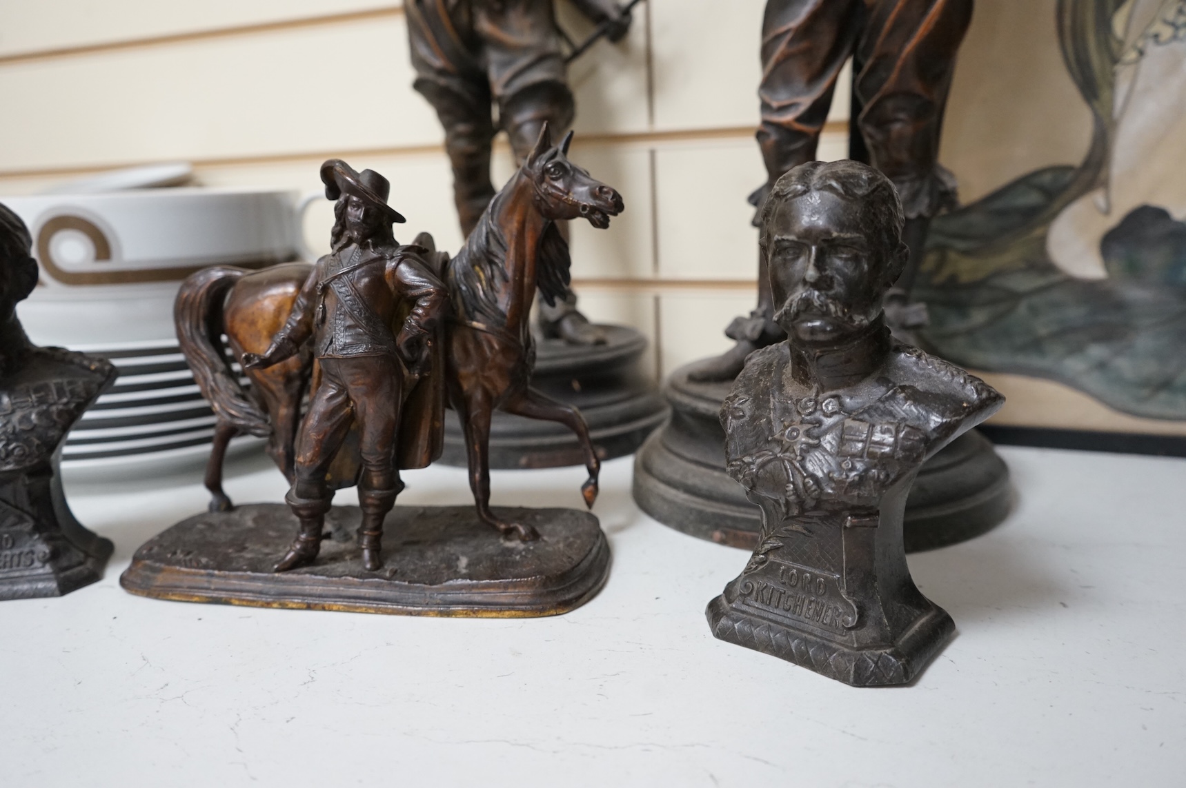 A pair of bronzed spelter figures, another pair of busts and a bronzed spelter group of a Cavalier and his horse, tallest 52cm